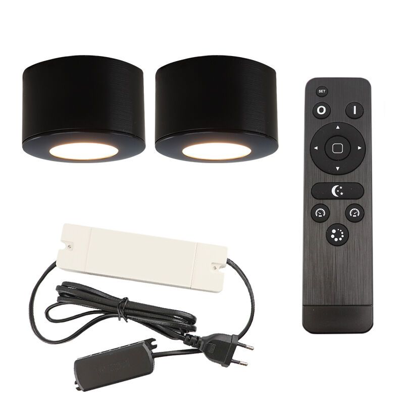 2 round black surface mounted spotlights Vasso, IP44, with connection set and remote control