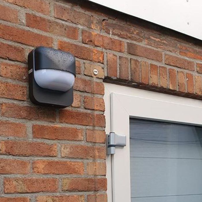 Black outdoor wall light with dusk to dawn sensor plastic, Aartie, IP44